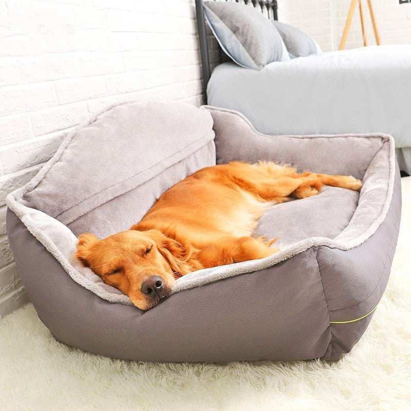 Dog sofa bed with raised supportive sides and soft cushion, featuring a comfortable golden retriever sleeping inside.