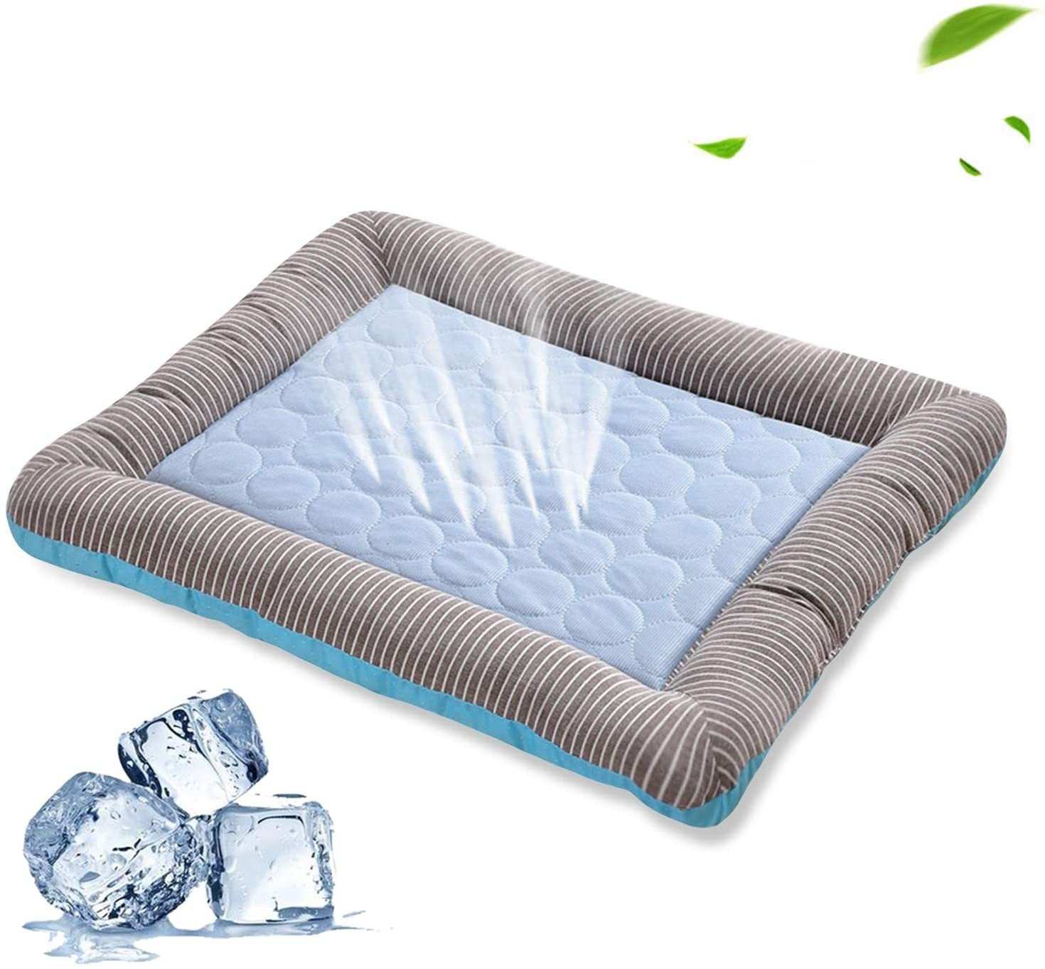 Golden retriever lying on a striped pet cooling pad bed with ice silk fabric and ice cubes nearby for summer comfort