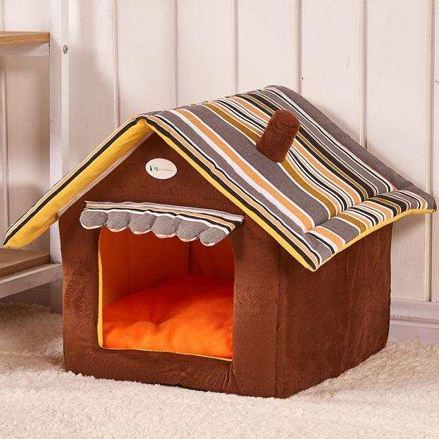 Striped house bed for small to medium pets with removable cover and cushioned interior in brown, yellow, and green stripes