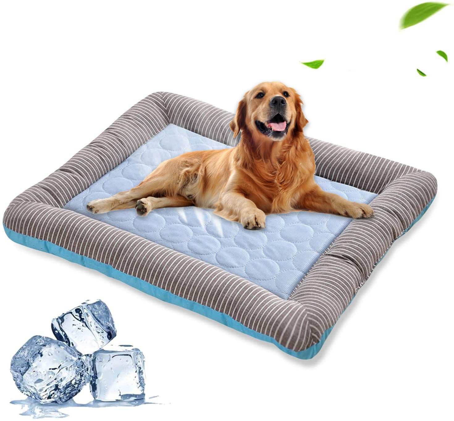 Golden retriever lying on a striped pet cooling pad bed with ice silk fabric and ice cubes nearby for summer comfort